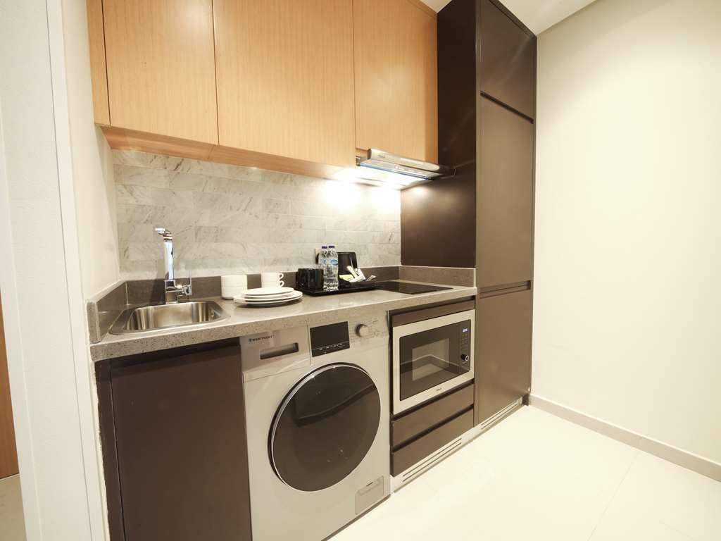 Adagio Jumeirah Village Triangle Dubái Habitación foto